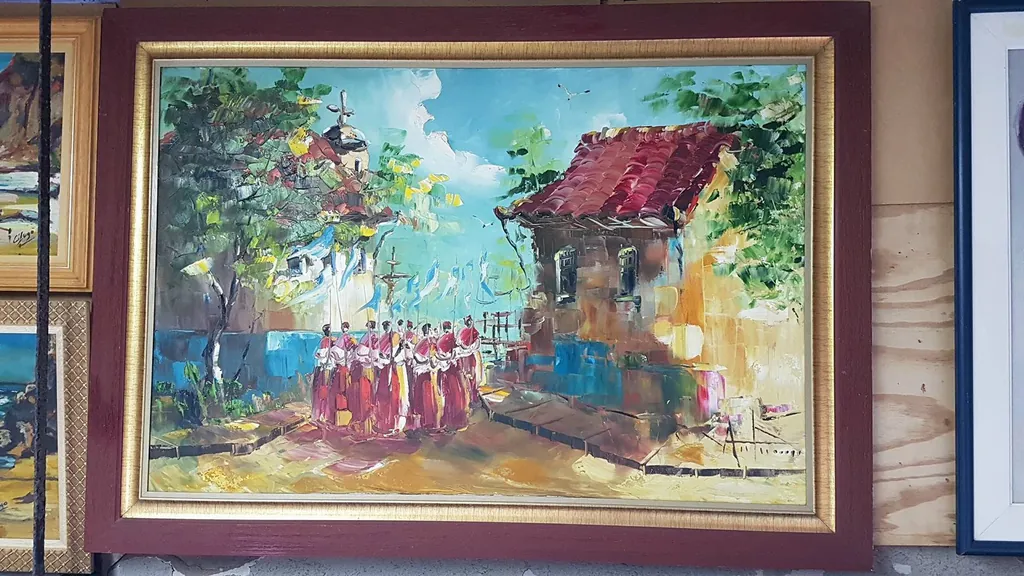 Quadros e molduras expostos na loja da GJ Molduraria em Santos