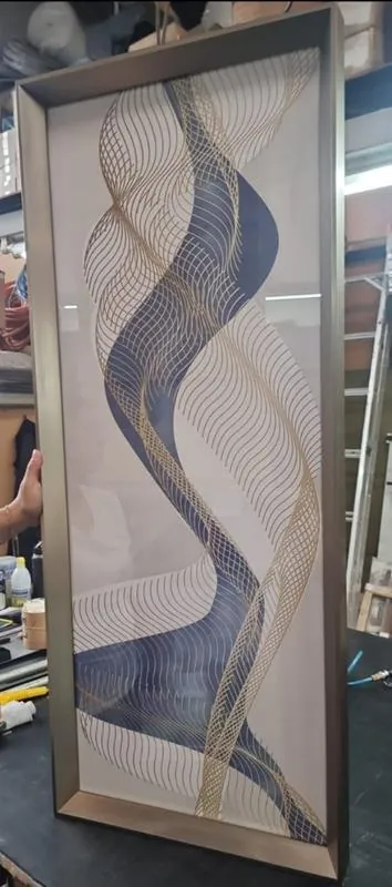 Montagem de quadros em caixa (box) na GJ Molduraria