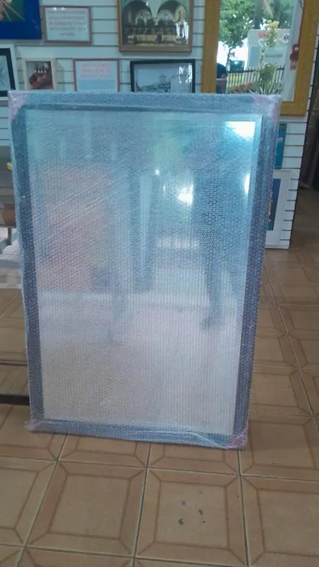 Montagem de quadros em caixa (box) na GJ Molduraria